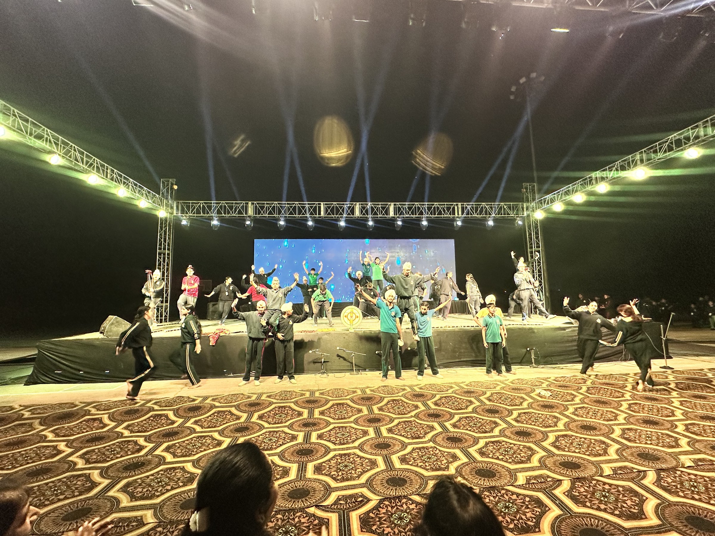 Students performing on stage at the Annual Function