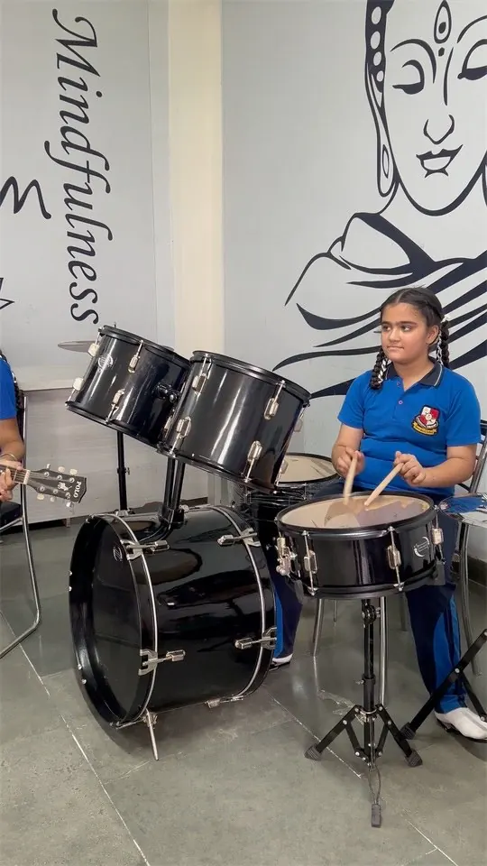 Music lab with keyboards, guitars and drums at Skonis World School
