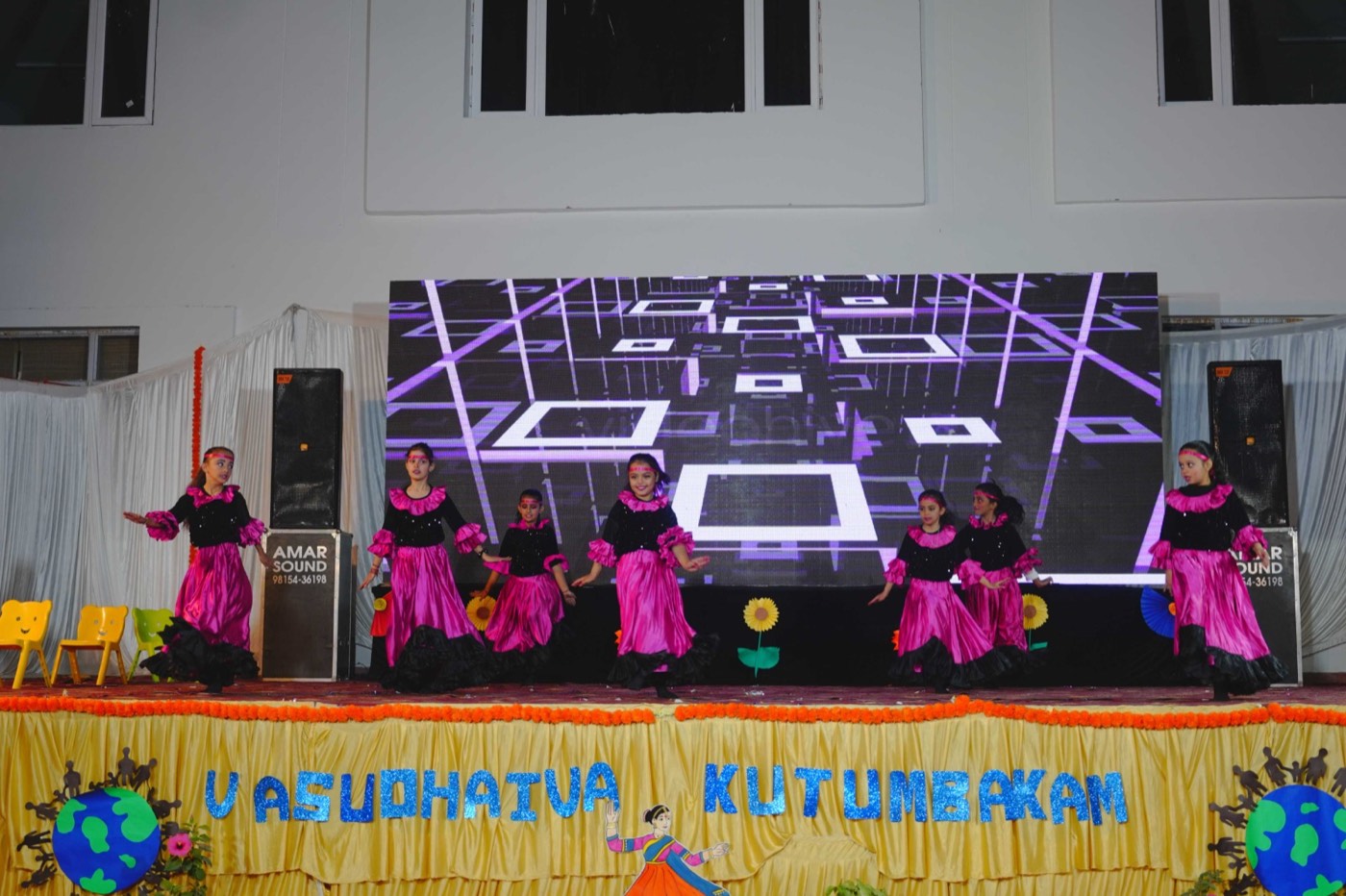 Students performing on stage
