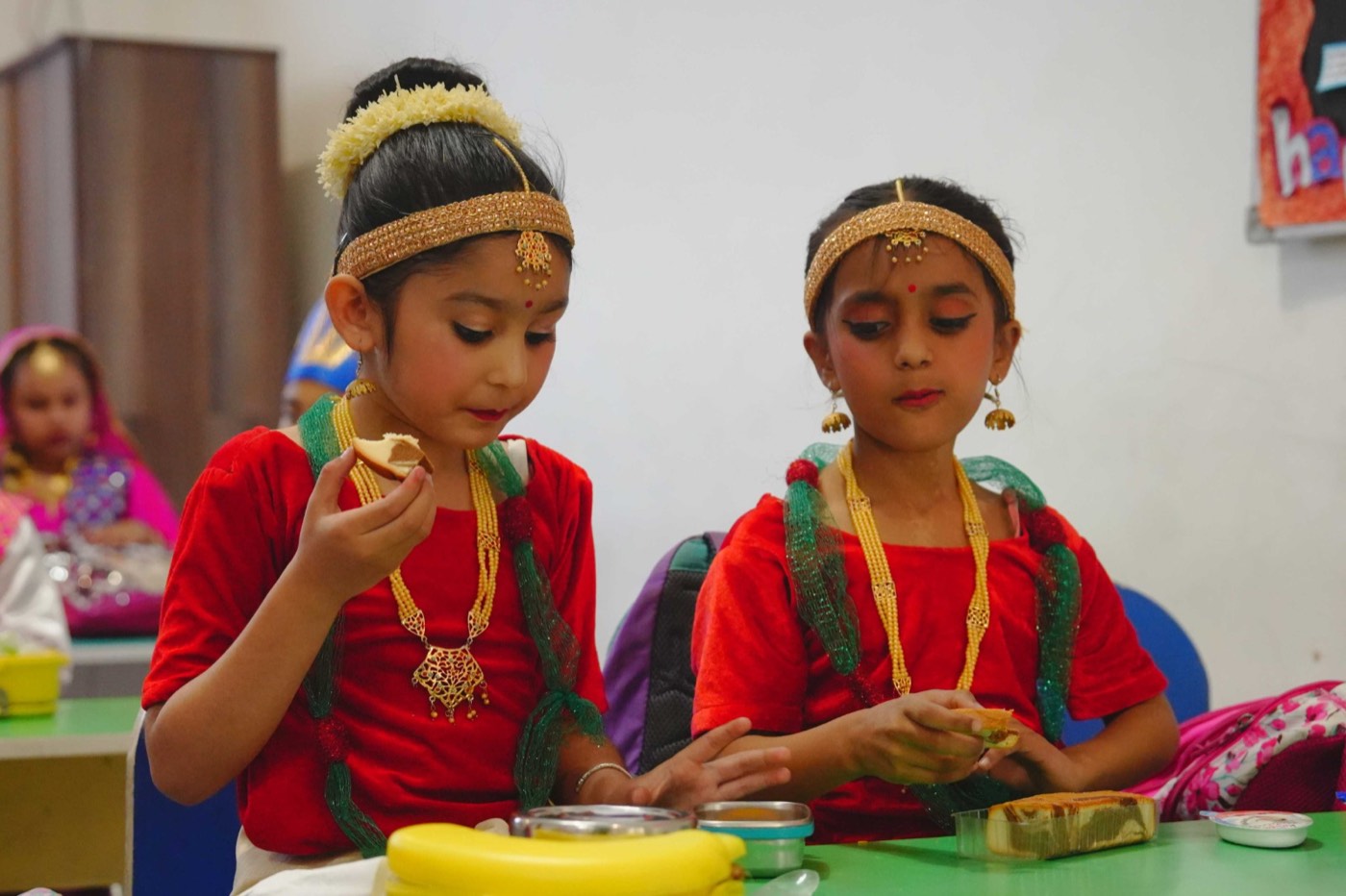 Two girls in traditional costumes