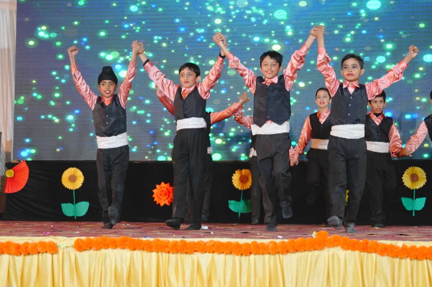 Students dancing on stage